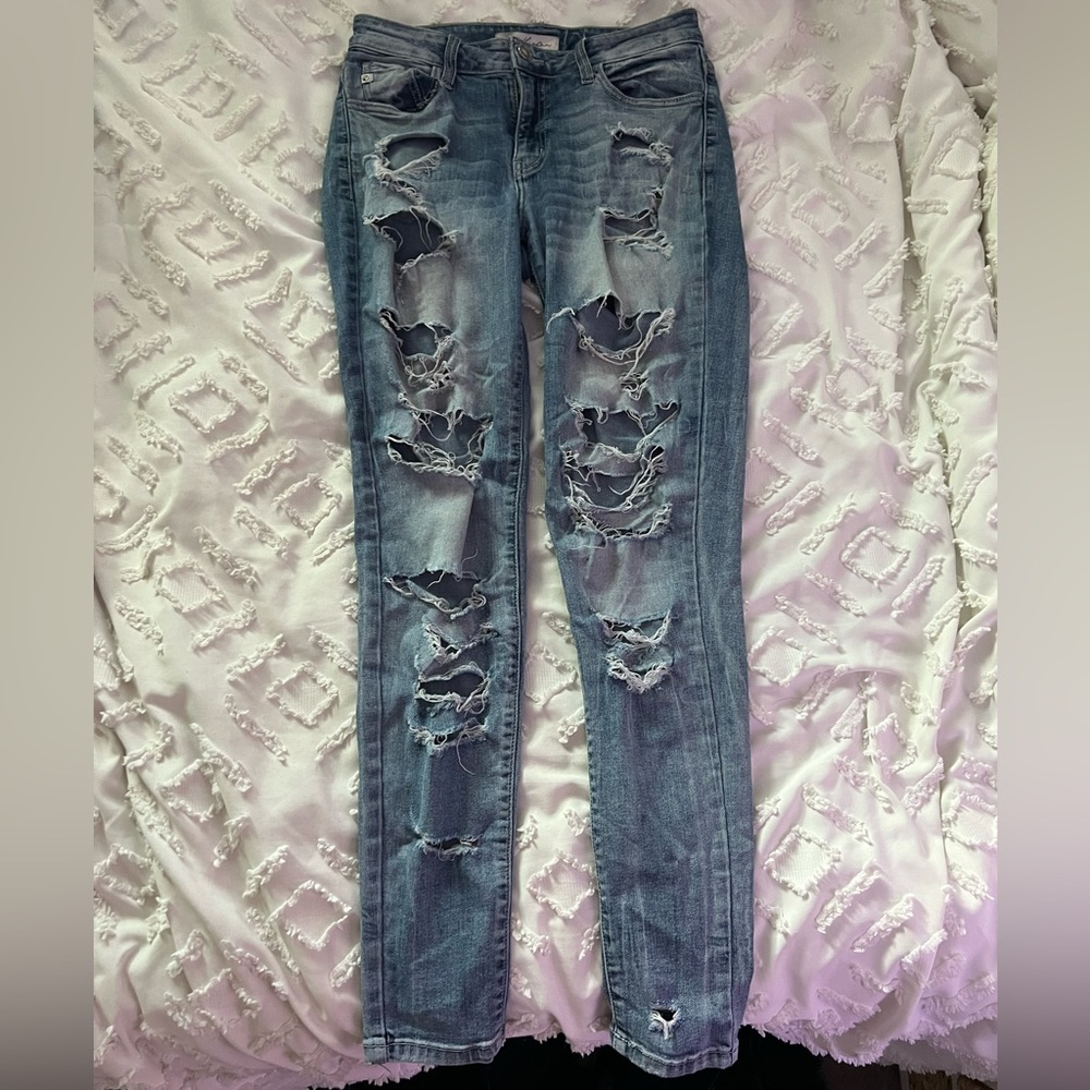 Woman’s Ripped Denim Jeans